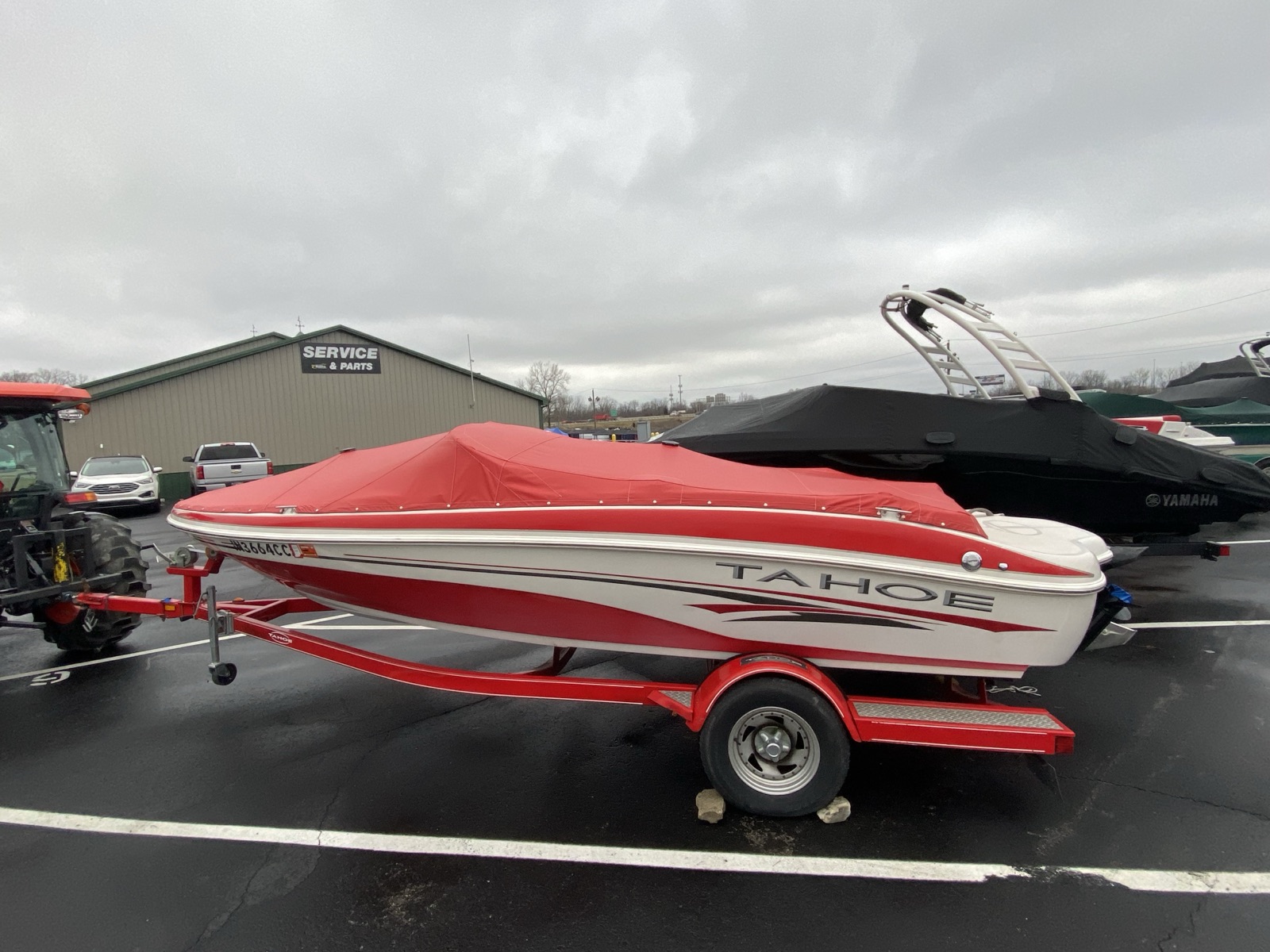 Color-matched red custom cover on Tahoe bowrider