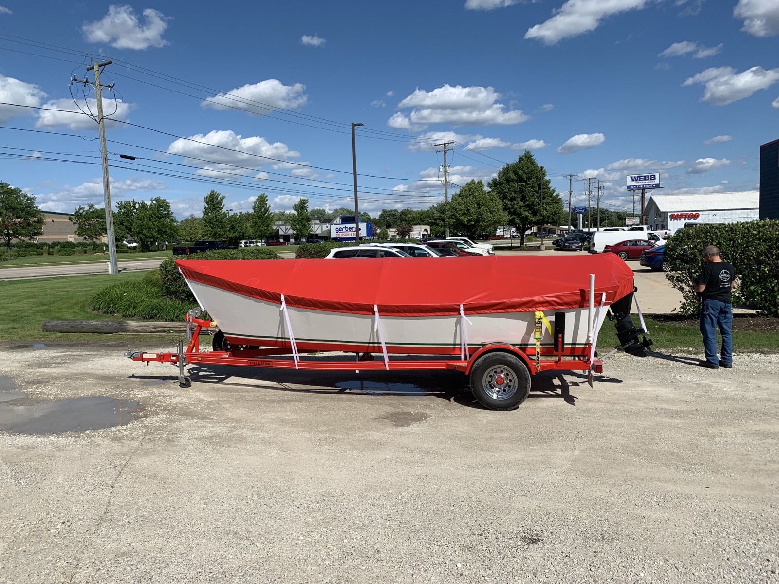 Vibrant red custom cover on classic runabout