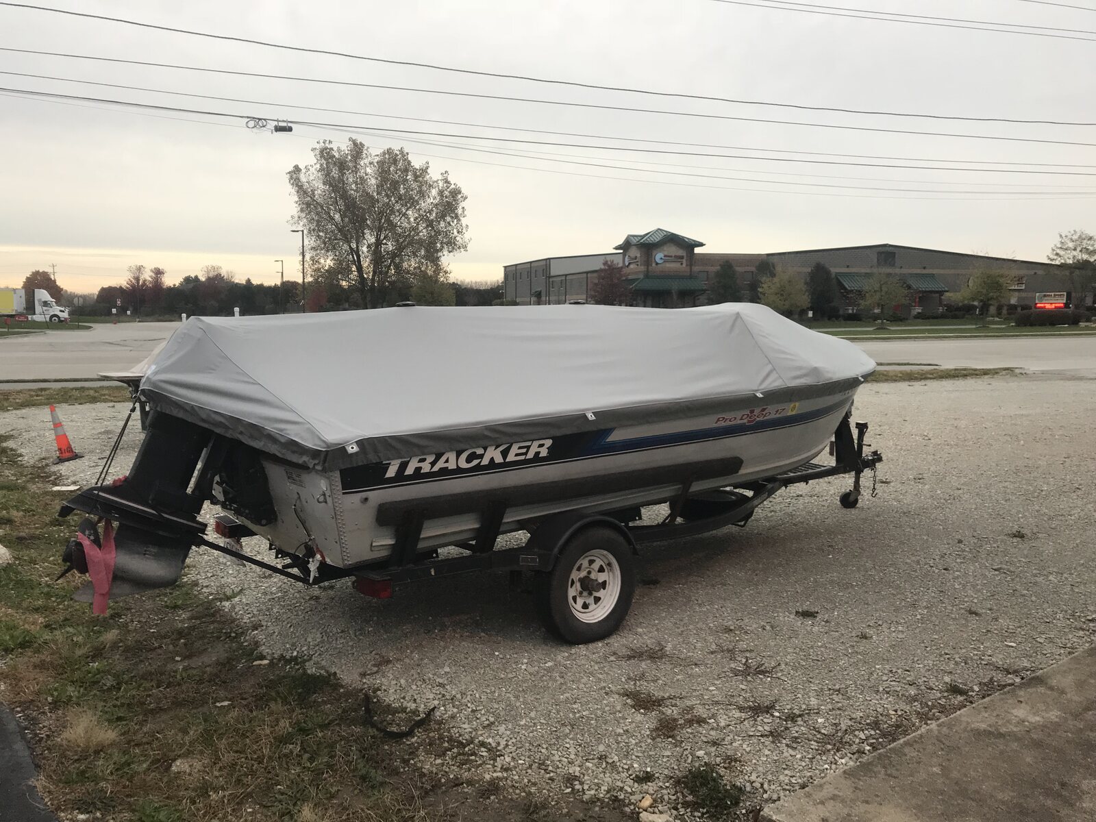 Gray cover on a Tracker aluminum fishing boat